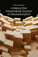 Okadka - Symboliczne stanowienie wadzy w organizacjach