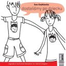 Okładka - Dostaliśmy po dziecku
