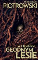 Ok�adka - W ciemnym, g�odnym lesie