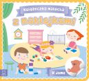 Ok�adka - Ksi��eczka malucha z naklejkami. W domu
