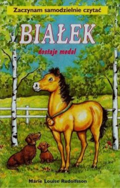 Okadka ksiki - Biaek dostaje medal