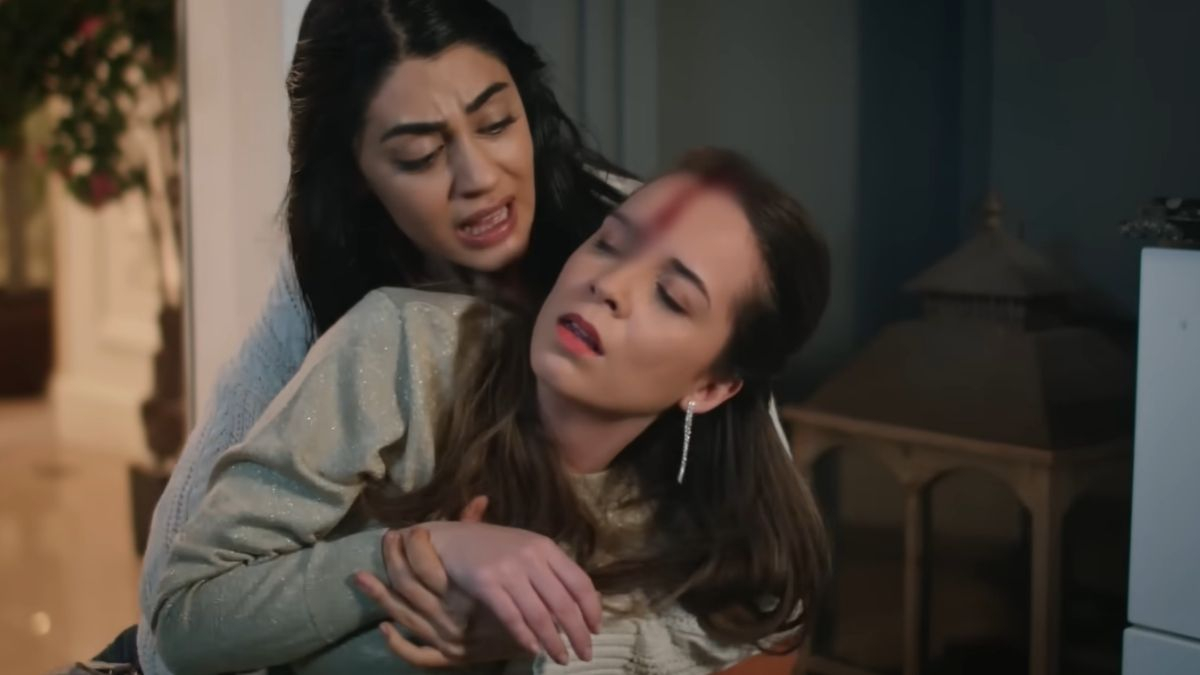 Panna młoda - kadr z serialu. Hancer łapie zakrwawioną i nieprzytomną Beyzę. 